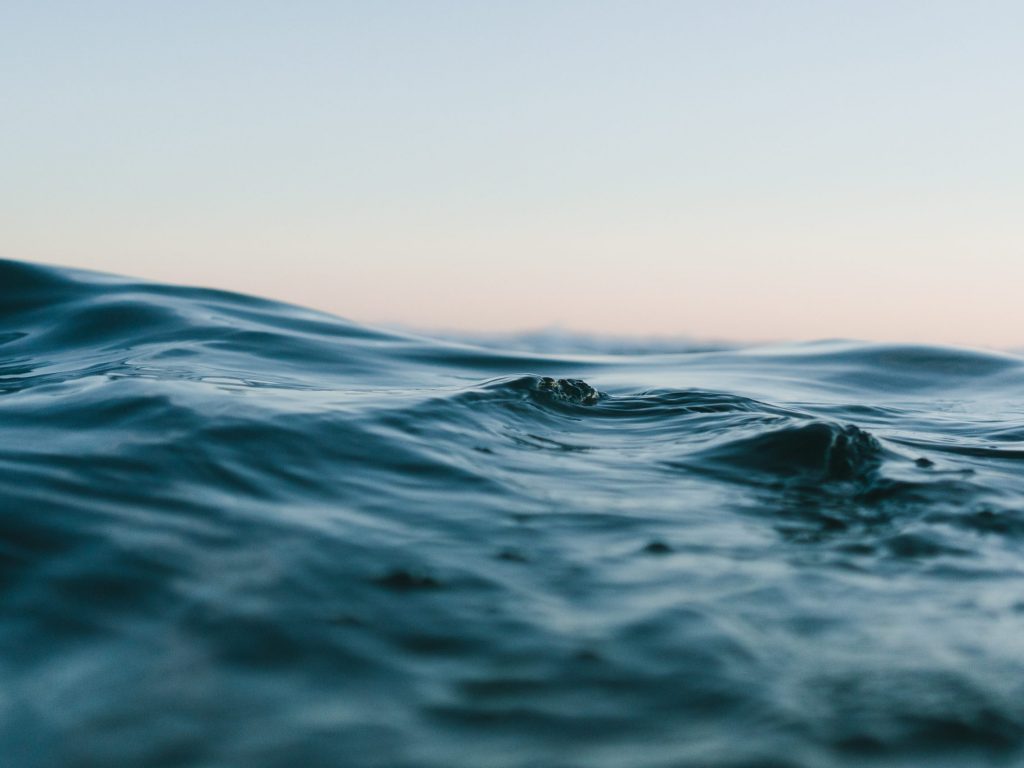 body-of-water-under-blue-and-white-skies-1533720